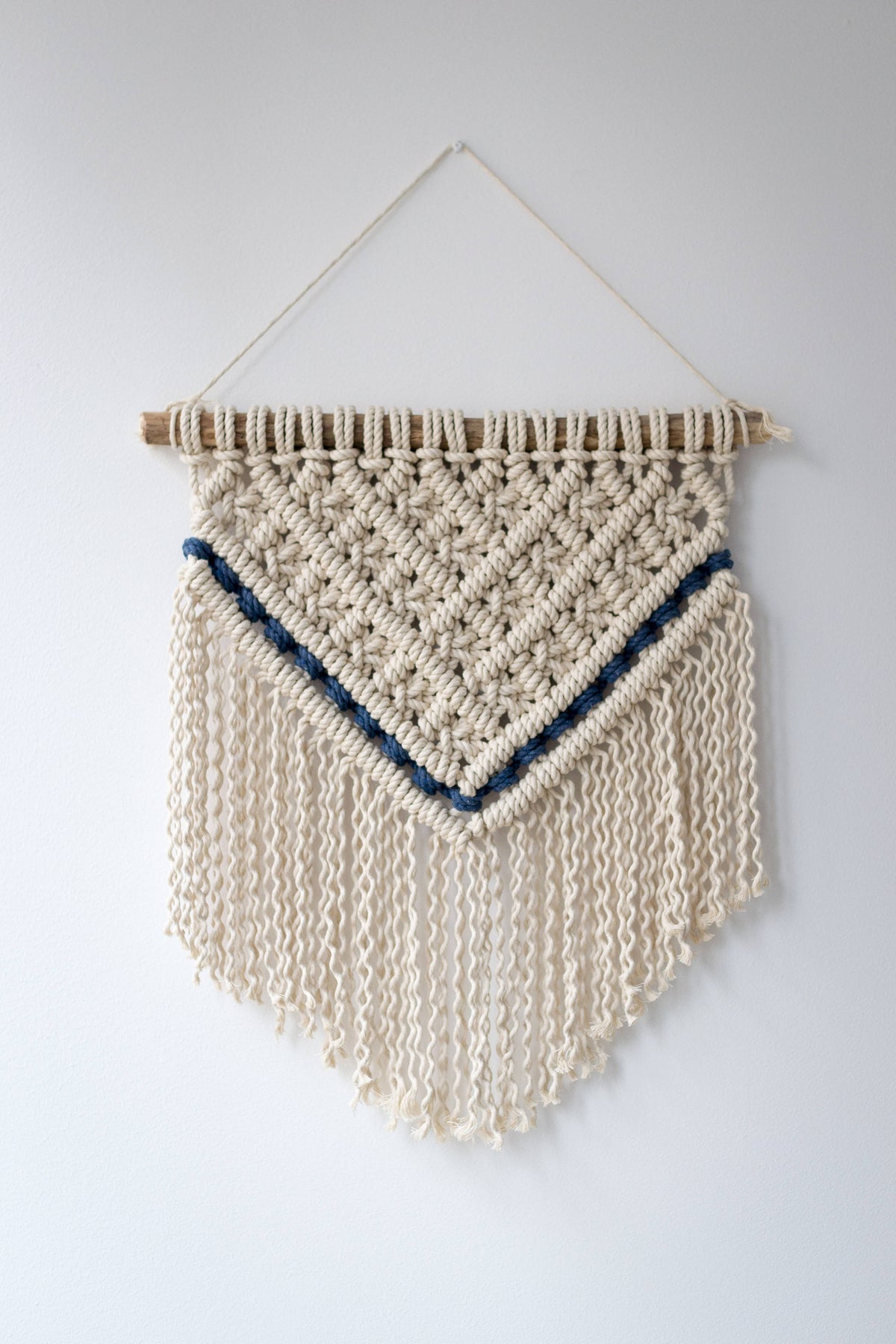 Macrame wall hanging with navy details