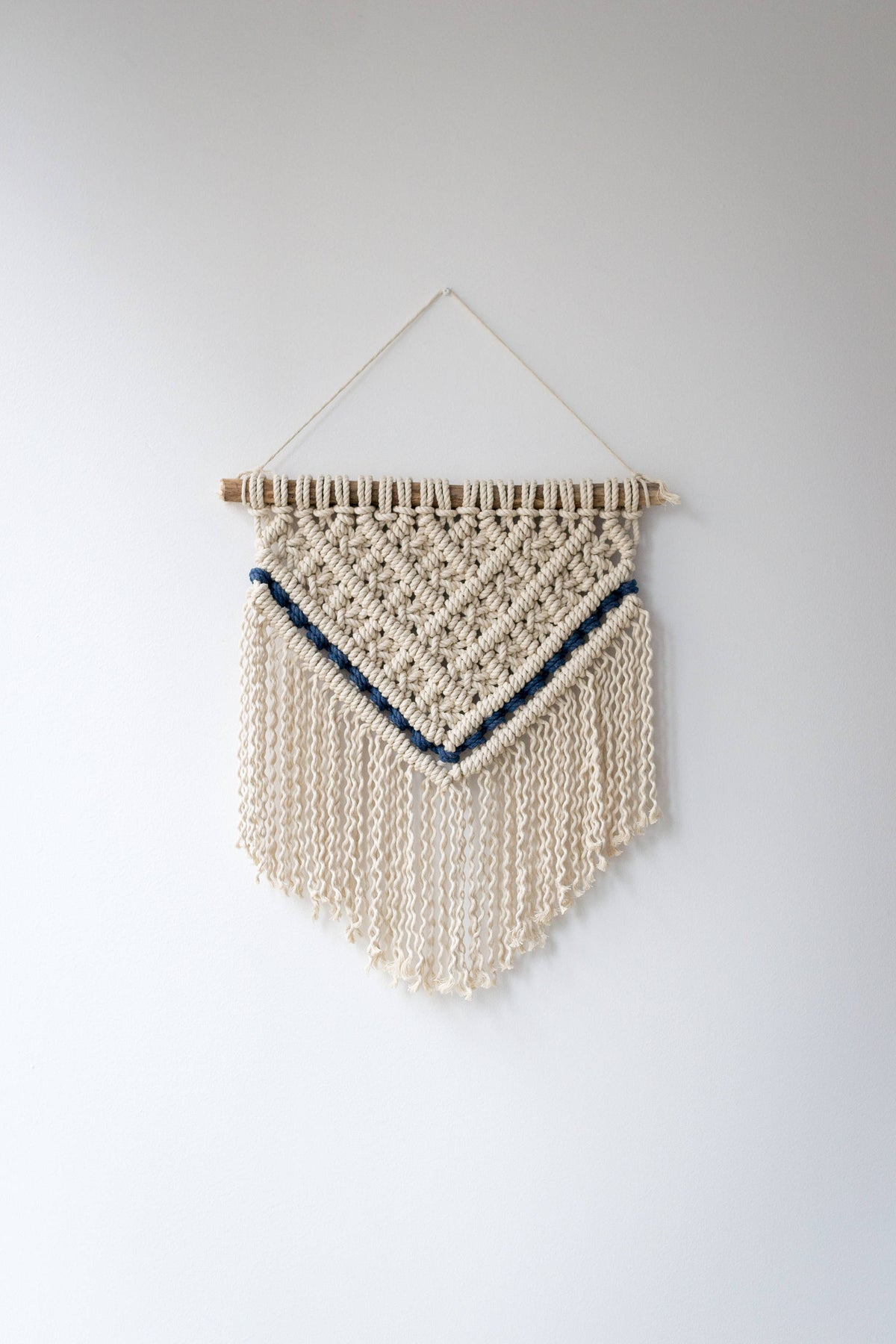 Macrame wall hanging with navy details