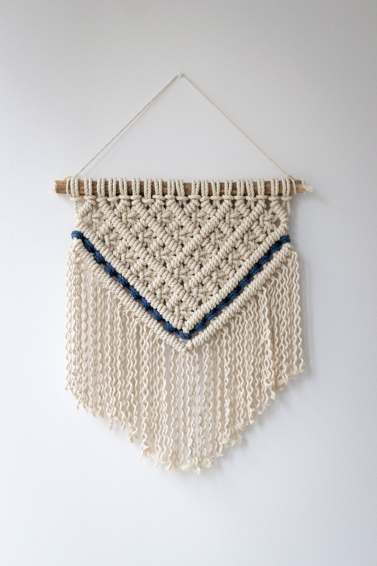 Macrame wall hanging with navy details